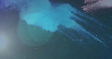 Parlayan ışık noktaları ve siyah arkaplanda hareket eden bulutların animasyonu. Renk, şekil, ışık ve hareket konsepti dijital olarak oluşturulmuş video.