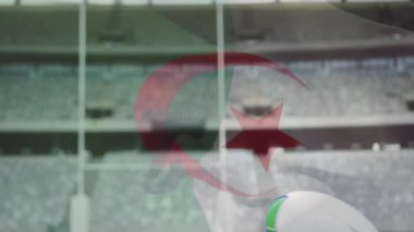 Rugby topu Cezayir bayrak animasyonu üzerinde kale direkleri ile sahada. Spor, rekabet, oyun, ulusal, takım, maç