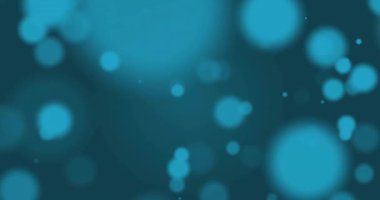Mavi arkaplanda hareket eden parlak ışık lekelerinin canlandırması. Işık, renk ve hareket konsepti dijital olarak oluşturulmuş video.