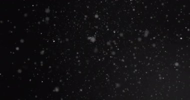 Siyah arka planda hareket eden ışık noktaları ve kar tanelerinin canlandırması. Şekiller, ışık, hareket ve arkaplan konsepti dijital olarak oluşturulmuş video.