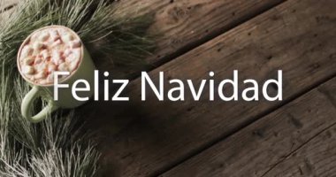 Feliz Navidad, Noel 'de tahta arka planda sıcak çikolata eşliğinde beyaz mesaj atmış. Noel, gelenek, İspanyolca, selamlar ve dijital olarak oluşturulan video kutlaması.