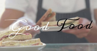 Sandviç hazırlamak, mutfakta şefin elinden iyi yemek mesajı göndermek. Yemek pişirme, yemek hazırlama, aşçılık, gurme, ev yapımı, taze