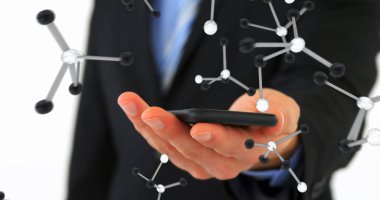 Image of molecules over caucasian businessman using smartphone. Global social media, technology and digital interface concept, digitally generated image. clipart