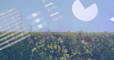 Çiftlikte büyüyen yemyeşil bitkiler üzerinde hareket eden birden fazla grafik ve verinin görüntüsü. Dijital bileşik, çoklu pozlama, bilgi, doğa, yel değirmeni ve manzara konsepti.