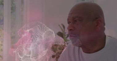 Afrika kökenli Amerikalı bir adamın alnına dokunduğu beyaz noktaların görüntüsü. Tıbbi ve sağlık hizmetleri konsepti, dijital olarak oluşturulmuş görüntü.