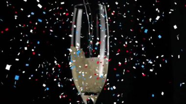 Siyah arka planda şampanya ve konfeti animasyonu. Parti, içki ve kutlama konsepti dijital olarak oluşturulmuş video.