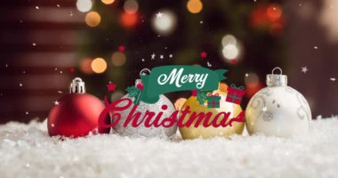 Kar yağarken atılan mutlu noel mesajlarının ve mücevherlerin animasyonu. Noel, yeni yıl ve dijital arayüz kavramı dijital olarak oluşturulmuş video.