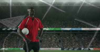 Stadyumda ragbi topu olan Afro-Amerikan bir adamın imajı. Spor, rekabet ve strateji kavramı, dijital olarak üretilen imaj.