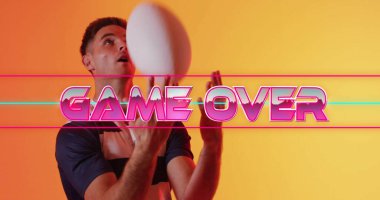 Game Over text image over surprised man in sports jersey. athlete, defeat, reaction, expression, failure, competition clipart