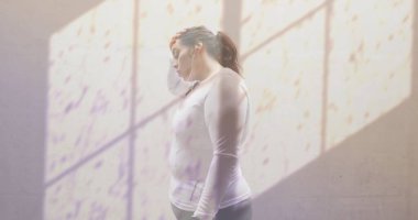 Image of shadow of window and water droplets over unhappy plus size caucasian woman. Sadness, stress, loneliness, depression and mental health, digitally generated image. clipart