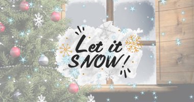 Kar taneleri ve Kar yağsın! Buzlu pencereyi kaplayan metin. Süslü bir Noel ağacı görünüyor, neşeli bir hava yaratıyor.
