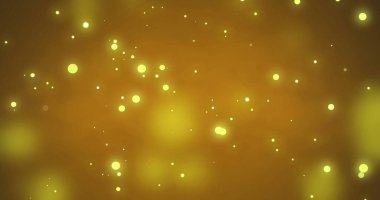 Sarı arkaplana düşen sarı noktaların görüntüsü. Noel, gelenek ve kutlama konsepti dijital olarak oluşturulmuş imaj.