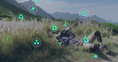 Yenilenebilir enerji ve sürdürülebilirlik, doğada rahatlayan kişi üzerindeki imajı simgeler. sürdürülebilir, ekoloji, çevre, yeşil, gevşeme, koruma