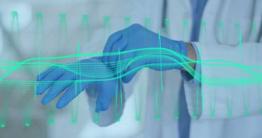 Ellerinin üzerinde kalp atışı dalgalanması olan eldivenler giyen bir doktor. Sağlık, tıbbi, kardiyoloji, teknoloji, koruyucu teçhizat, dijital
