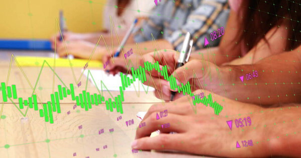 Image of financial data processing over diverse students taking notes. Global education, finances, computing and digital interface concept digitally generated image.