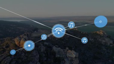 Dağlık araziye bağlı müzik ve Wi-Fi ikonlarının animasyonu. Soyut, teknoloji, bağlantı, kablosuz, ses, ağ