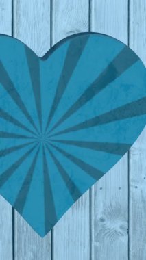 Kalp üzerinde dönen mavi çizgili arka plan animasyonu mavi ahşap yüzeydeki deliği şekillendirir. şekil, renk, hareket, duygular ve aşk konsepti dijital olarak oluşturulmuş video.