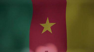 Kültürel ve ulusal unsurları harmanlayan çapraz animasyonlu kamerun bayrağı. kültür, sembolizm, miras, vatanseverlik, çeşitlilik, tasarım