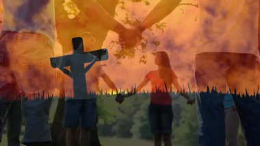 Ağacın altında el ele tutuşan, gün batımlı siluetli bir çift ve çapraz animasyon. Romantizm, maneviyat, inanç, aşk, doğa, birliktelik.