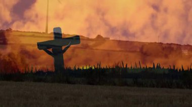 Çimenli manzaranın üzerinde haç silueti olan canlı günbatımı gökyüzü. Doğa, alacakaranlık, alacakaranlık, ruhani, huzur