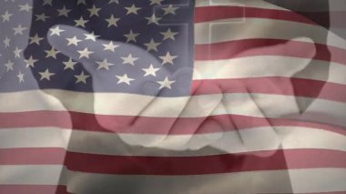 Amerikan bayrağı tokalaşmayı simgeliyor. Animasyondaki birlik ve ortaklığı simgeliyor. işbirliği, anlaşma, ittifak, takım çalışması, vatanseverlik, güven