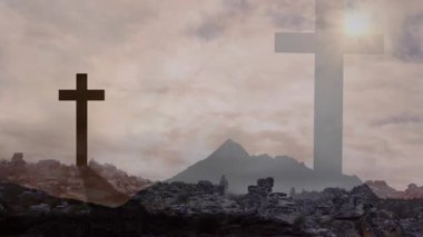Bulutlu gökyüzü siluetli haçlar ve kayalık araziler dramatik bir manzara yaratıyor. Huysuz, uğursuz, ruhanilik, doğa, manzaralı, karamsar