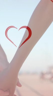 Çeşitli çiftlerin el ele tutuşarak kalplerinin düşüşünün canlandırması. moda ve yaşam tarzı konsepti dijital olarak oluşturulmuş video.