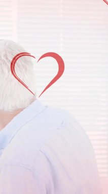 Kafkasyalı adamın üzerine düşen kalp animasyonu ve erkek doktorla oğlu. moda ve yaşam tarzı konsepti dijital olarak oluşturulmuş video.