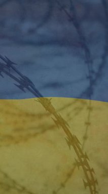 Saha ve dikenli teller üzerinde Ukrayna bayrağı animasyonu. Ukrayna krizi ve uluslararası politika kavramı dijital olarak oluşturuldu.