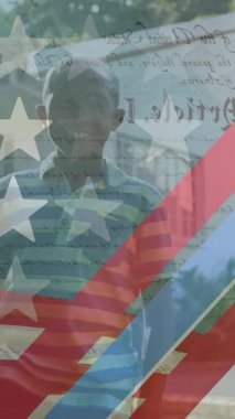 Amerikan bayrağının Kafkasyalı Afrikalı Amerikalı çocuk üzerinde canlandırılması. Vatanseverlik ve kutlama konsepti dijital olarak oluşturulmuş video.