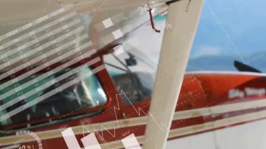 Veri görselleştirmesinin animasyonu ve yüzdelik grafikleri uçak kokpitinde üst üste biniyor. Havacılık, veri analizi, bilgi grafikleri, teknoloji, gösterge paneli, istatistik