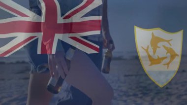 Kumsalda yürüyen, İngiliz bayrağı taşıyan ve animasyonda Anguilla amblemi olan insanlar. Kıyı, okyanus, kıyı, tropik, seyahat, turizm