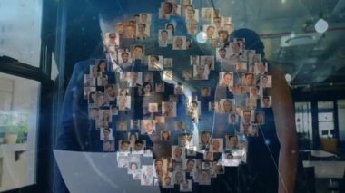 Ofiste çeşitli portrelerin animasyonunda işbirliği yapan iş adamları. Çeşitlilik, takım çalışması, işbirliği, etnik köken, yaratıcılık, yenilik