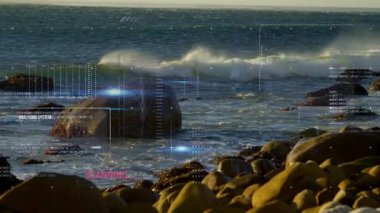 Dijital analiz ile kayaların üzerine düşen okyanus dalgaları animasyonu örtüyor. Deniz, teknoloji, deniz, doğa, yenilik