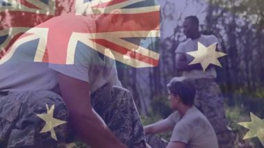 Avustralya bayrağının üzerinde çeşitli gruplar doğada animasyonla çalışıyor. Takım çalışması, işbirliği, çeşitlilik, çevre, yaratıcılık, işbirliği