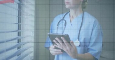 Tabletin finansal grafik verilerini analiz ediyorum. Hastane ortamındaki sağlık uzmanı. Finans, analitik, teknoloji, ilaç, veri analizi, yatırım