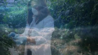 Serada, bilim adamı dijital animasyon teknolojisi ile bitkileri inceliyor. yenilik, araştırma, laboratuvar, tarım, biyoteknoloji, sürdürülebilirlik