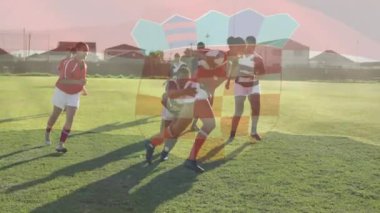 Sahada, rugby oyuncuları kalkan kaplamasının animasyonuyla mücadele ediyorlar. Spor, savunma, rekabet, eylem, güç, takım çalışması