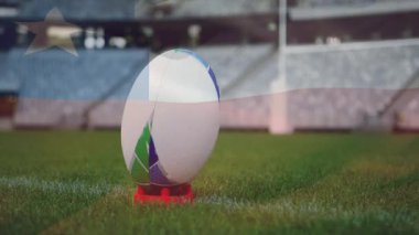 Stadyumda rugby topu ve arka planda bayrak animasyonu. Spor, rekabet, ulusal, atletizm, eğlence, etkinlik