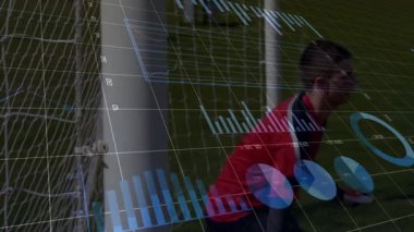 Kaleci sahneyi kaplayan finansal veri tablolarının animasyonuyla kaydediyor. spor, finans, borsa, analitik, takım çalışması, strateji