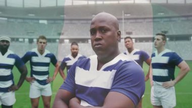 Animasyon şekilli ragbi takımı sahada bir arada duruyor. Takım çalışması, birlik, spor, rekabet, güç, atlet