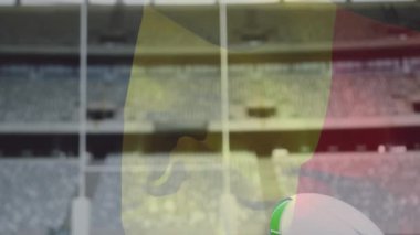 Stadyumda, arka planda kale direkleri ve animasyonla golf sahasında ragbi topu. Spor, yarışma, saha, atletik, maç