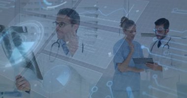 Tıbbi veriler analiz ediliyor, doktorlar hastane ortamında animasyon teknolojisi kullanıyor. Sağlık, yenilik, veri analizi, tıp, tanı, araştırma