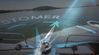 Pusula animasyonunu sakin suda teknenin üzerine yazılı olarak aktar. Navigasyon, yön, denizcilik, rehberlik, sükunet, okyanus