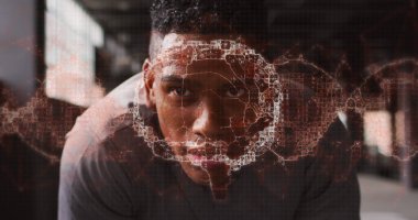 Afrika kökenli Amerikalı bir adamın portresi karşısında insan beyni dönüyor. tıbbi araştırma ve spor konsepti.