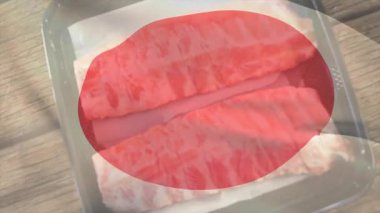 Tepside kırmızı kaplamalı iki parça çiğ somon balığı. Taze, deniz ürünleri, gurme, mutfak, balık, mutfak