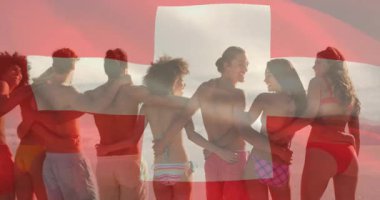 Elinde İsviçre bayrağı, mayo giymiş arkadaşlar sahilde birlikte poz veriyor, yazın tadını çıkarıyorlardı. Tatil, dostluk, vatanseverlik, boş zaman, eğlence