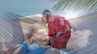 Dalgalı bayrak ve palmiye ağacı animasyonu hamakta dinlenen çiftleri kaplıyor. Tatil, rahatlama, tropikal, cennet, boş zaman, dijital sanat