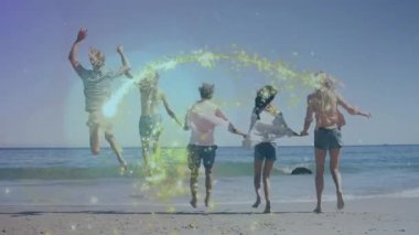 Parlak ışık efektleriyle plaja atlamak, canlı animasyonlar yaratmak. Kutlama, mutluluk, hareket, birlik, tatil, parti