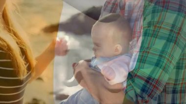 Romantik açık hava ortamında, İrlanda bayrağı animasyonuyla öpüşen çift. Aşk, aşk, açık hava, kutlama, İrlanda, sevgi